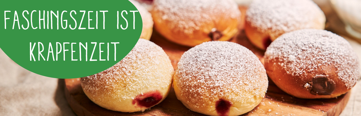 KI generiert: Krapfen mit Puderzucker auf Holzbrett, Text: "Faschingszeit ist Krapfenzeit".