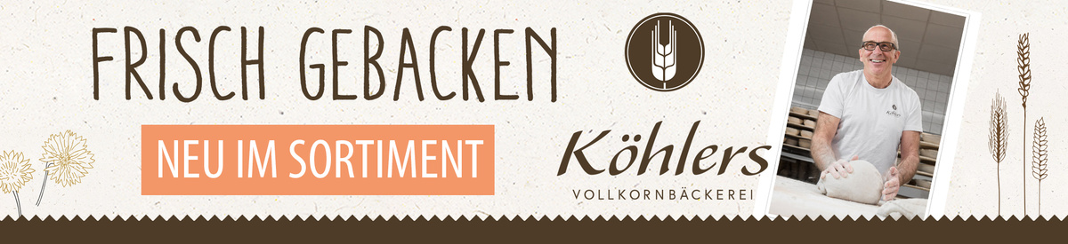 KI generiert: Frisch gebackenes Brot von Köhlers Vollkornbäckerei, neu im Sortiment.