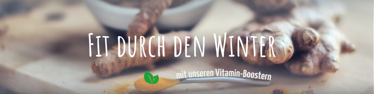 KI generiert: Ingwer auf einem Tisch mit dem Text: "Fit durch den Winter mit unseren Vitamin-Boostern".